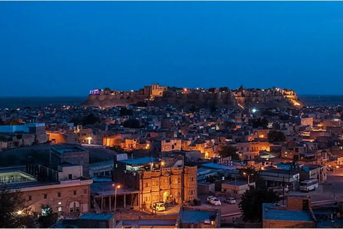 Jaisalmer Fort and the old city lit up at twilight