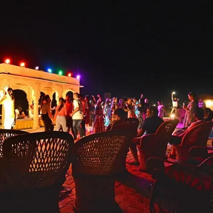 Guests enjoying the evening programme at the camp