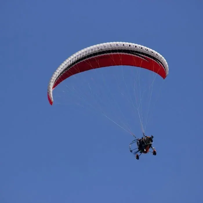 Powered paraglider flying over Jaisalmer desert